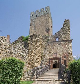 A steep path leads up to the castle gateway